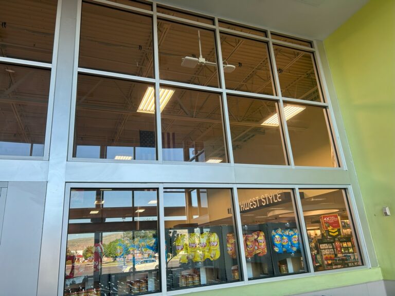 Large multi-pane commercial window wall cleaned streak-free